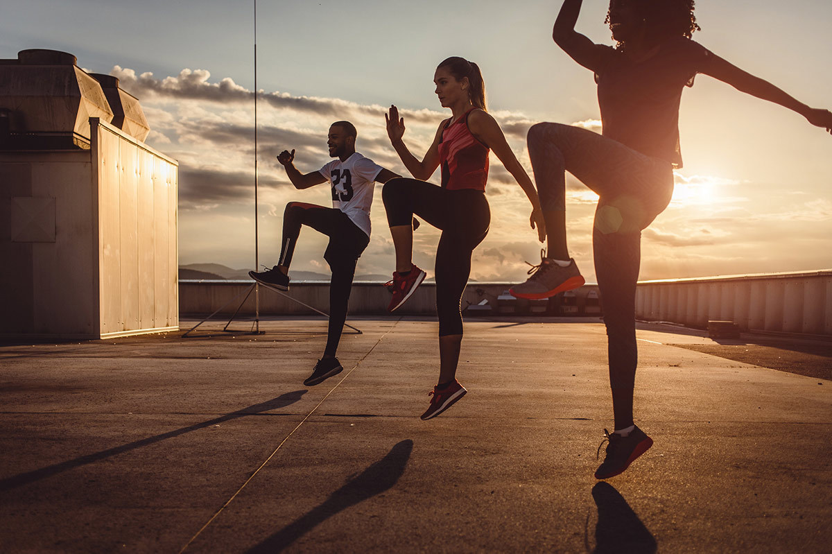 Group of Friends Working Out Together to Reduce Stress